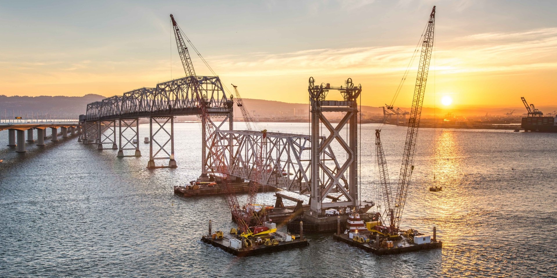 bridge construction at sunset